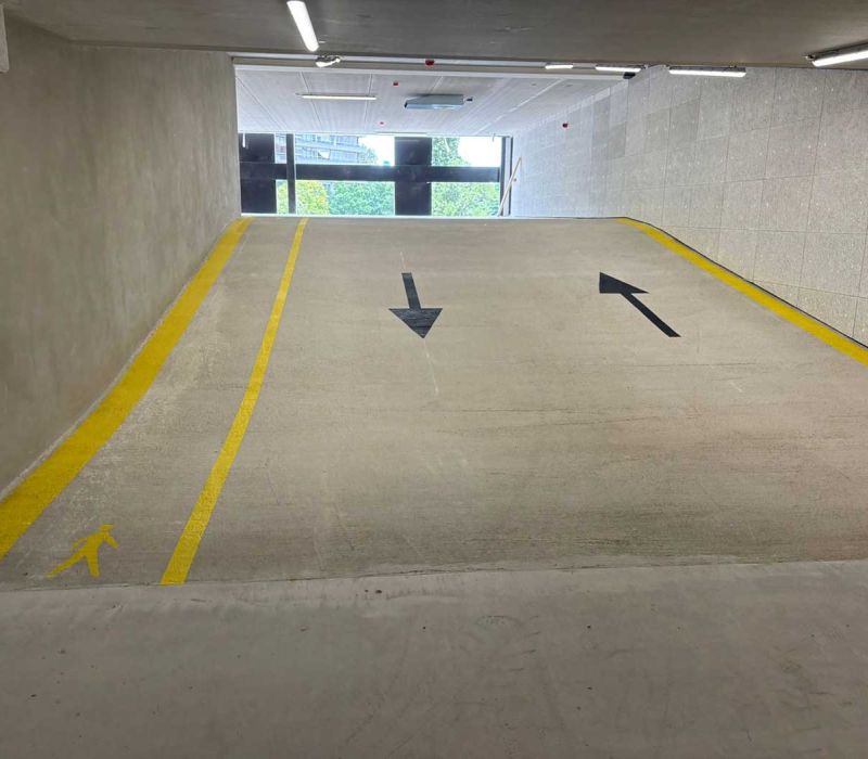 Parkeergarage nieuwbouwcomplex Utrecht voorzien van coating en markeringen