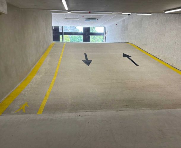 Parkeergarage nieuwbouwcomplex Utrecht voorzien van coating en markeringen